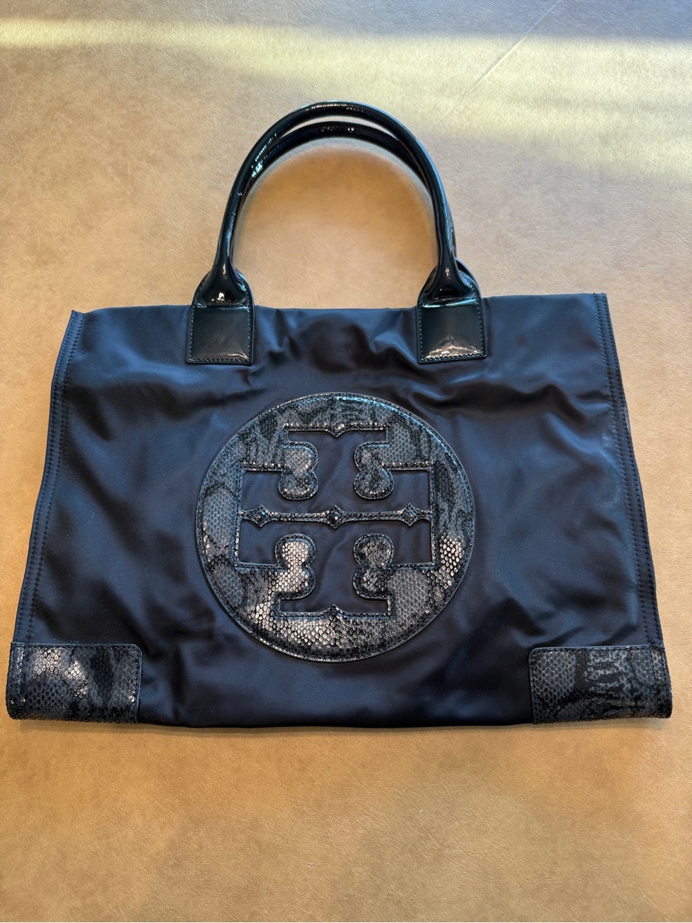 Tory Burch Black Tote with Patent Handles and Logo Patch